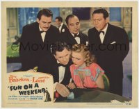 9b291 FUN ON A WEEKEND LC #6 1947 Priscilla Lane, Fowley & others watch Eddie Bracken gambling!