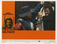 9b649 OUTLAW JOSEY WALES LC #3 1976 great close up of Clint Eastwood fighting soldier!