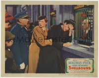 9b802 SPELLBOUND LC 1945 Alfred Hitchcock, Ingrid Bergman holds Gregory Peck buying train tickets!