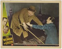 9b986 WOMAN IN GREEN LC 1945 Basil Rathbone as Sherlock Holmes saving Nigel Bruce as Dr. Watson!