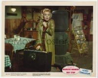 9h024 BUS STOP color 8x10 still 1956 bewildered Marilyn Monroe with overcoat and suitcase!