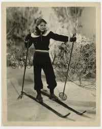 9h535 JEAN PARKER 8x10.25 still 1930s with her skis & poles in black, orange & white ski suit!