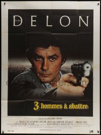 9j971 THREE MEN TO DESTROY French 1p 1980 cool super close image of Alain Delon pointing gun!