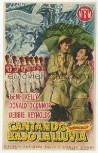 9m419 SINGIN' IN THE RAIN 1pgt Spanish herald 1953 Gene Kelly & Debbie Reynolds under umbrella!