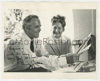 9r870 HENRY FONDA signed 8x10 REPRO still 1980s smiling as he looks through photos of actors!