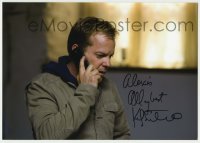 9r723 KIEFER SUTHERLAND signed color 8.25x11.75 REPRO photo 2000s great close up talking on phone!