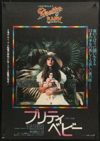 9t368 PRETTY BABY Japanese 1978 directed by Louis Malle, young Brooke Shields sitting with doll!