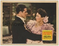 9y528 HEAVEN CAN WAIT LC 1943 close up of Don Ameche holding shocked Gene Tierney, Ernst Lubitsch