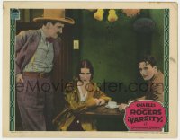 9y928 VARSITY LC 1928 man in cowboy hat smiles at Mary Brian & Buddy Rogers sitting at table!