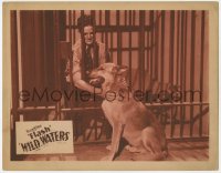 9y975 WILD WATERS LC 1935 Flash the dog stays by his master's side, even when he's in jail!