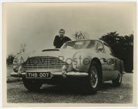 1a364 GOLDFINGER 8x10.25 still 1964 great image of Sean Connery as James Bond by his Aston Martin!