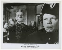 1a559 MAGICIAN 8x10 still R1970s directed by Ingmar Bergman, stern man over guy in uniform!