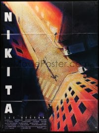 1c719 LA FEMME NIKITA French 1p 1990 Luc Besson, cool overhead art of Anne Parillaud in alley!