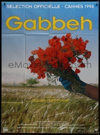 1j674 GABBEH French 1p 1996 Mohsen Makhmalbaf, great image of hand holding flowers over a field!