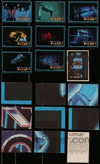 1s688 LOT OF 9 TRON TRADING CARDS AND STICKERS 1982 scenes from the movie w/ puzzle on the back!
