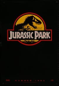 1w778 JURASSIC PARK teaser 1sh 1993 Steven Spielberg, classic logo with T-Rex over yellow background