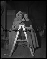 1x045 DRUMS ACROSS THE RIVER 8x10 negative 1954 candid of Audie Murphy & Lisa Gaye by ladder!