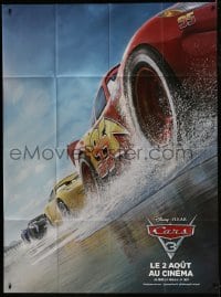 2f595 CARS 3 advance French 1p 2017 Disney/Pixar, CGI c/u image of Lightning McQueen on beach!