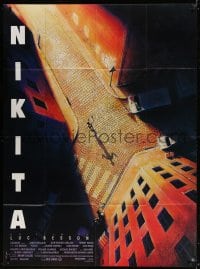 2f768 LA FEMME NIKITA French 1p 1990 Luc Besson, cool overhead art of Anne Parillaud in alley!