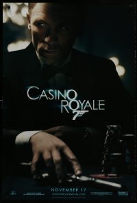 2g161 CASINO ROYALE teaser DS 1sh 2006 Craig as James Bond sitting at poker table w/gun!