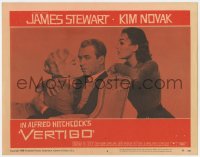 2m004 VERTIGO LC #6 1958 Hitchcock, James Stewart hugs blonde Kim Novak with brunette Kim behind!