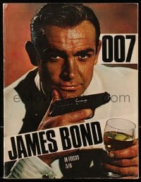 2s825 007 JAMES BOND IN FOCUS softcover book 1964 many images from Sean Connery's spy movies!