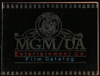 2s860 MGM/UA ENTERTAINMENT CO. FILM CATALOG foil softcover book 1982 great color movie images!
