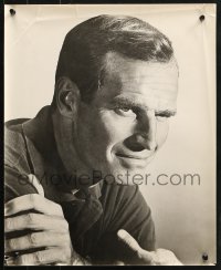 2w023 CHARLTON HESTON 16.25x20 still 1960s cool smiling seated close-up with arms crossed!