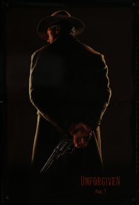 2w969 UNFORGIVEN teaser DS 1sh 1992 image of gunslinger Clint Eastwood w/back turned, dated design!