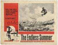 3b427 ENDLESS SUMMER LC 1965 Bruce Brown, Mike Hynson on surfboard by Robert August paddling!