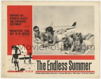 3b429 ENDLESS SUMMER LC 1967 Robert August & Mike Hynson on beach with sexy girls & surfboard!