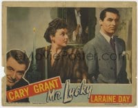 3b518 MR. LUCKY LC 1943 Laraine Day in fur coat staring at perplexed Cary Grant, gambling classic!