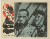 3b544 PASSAGE TO MARSEILLE LC 1944 great c/u of Humphrey Bogart & Sydney Greenstreet w/bar shadows!