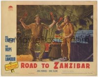3b559 ROAD TO ZANZIBAR LC 1941 close up of zany Bob Hope & Bing Crosby about to hit jungle drums!