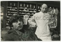 3d191 ROMAN POLANSKI signed 8x11.5 still 1976 he's given first aid in pharmacy in The Tenant!