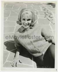 3d499 EVA MARIE SAINT signed 8x10.25 still 1960s smiling on the ground when she worked at MGM!