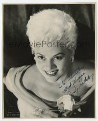 3d564 JUDY HOLLIDAY signed 7.75x9.5 still 1951 overhead portrait in low-cut dress, Born Yesterday!