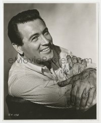 3d659 ROCK HUDSON signed 7.75x9.5 still 1960s wonderful smiling portrait with his arms crossed!