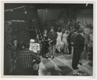 3h469 JET PILOT candid 8.25x10 still 1957 John Wayne & Janet Leigh prepare for a dance scene on set!