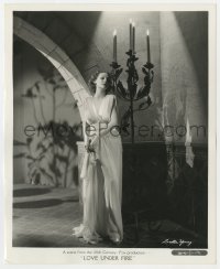 3h571 LOVE UNDER FIRE 8x10 still 1937 Loretta Young in triple sheer crepe gown w/ deep V neckline!