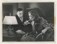 3h898 TO HAVE & HAVE NOT 8x10.25 still 1944 Humphrey Bogart lights young Lauren Bacall's cigarette!