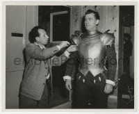 3h993 YOUNG BESS candid deluxe 8.25x10 still 1953 Stewart Granger is bolted into his suit of armor!