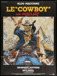 3w570 COWBOY French 1p 1985 wacky Pat Claeys art of Aldo Maccione with lots of weapons & black cat!