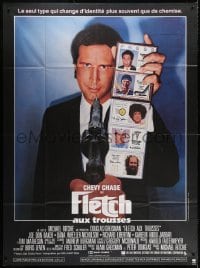 3w627 FLETCH French 1p 1985 wacky detective Chevy Chase showing fake ID cards at gunpoint!