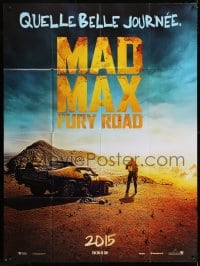 3w777 MAD MAX: FURY ROAD teaser French 1p 2015 great image of Tom Hardy standing by his car!