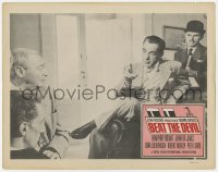 4a239 BEAT THE DEVIL LC R1963 seated Humphrey Bogart talks to Peter Lorre & two other men!