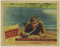 4a282 BRIDGE ON THE RIVER KWAI LC #6 1958 close up of William Holden holding knife on beach!
