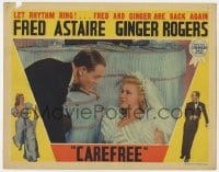 4a297 CAREFREE LC 1938 Fred Astaire looks down on Ginger Rogers on floor in bridal gown!