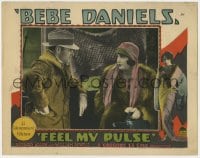 4a410 FEEL MY PULSE LC 1928 close up of Bebe Daniels in fur coat staring at Richard Arlen!