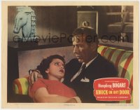 4a579 KNOCK ON ANY DOOR LC #3 1949 Candy Toxton laying in Humphrey Bogart's lap, Nicholas Ray!
